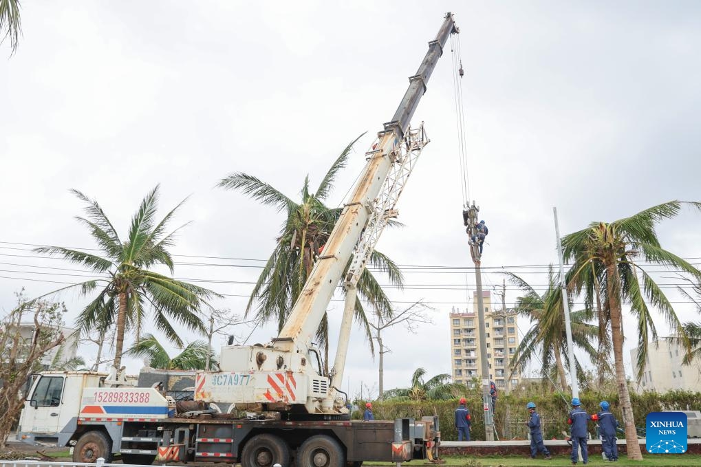 Staff members of power company from Guizhou Province repair electrical facilities in Longlou Town of Wenchang, south China's Hainan Province, Sept. 9, 2024. Super Typhoon Yagi, the strongest autumn typhoon to land in China since 1949, hit Hainan on Friday and caused power outages in many areas. China Southern Power Grid has deployed emergency power repair personnel and vehicles to support the disaster relief and power restoration efforts in Hainan. (Photo: Xinhua)