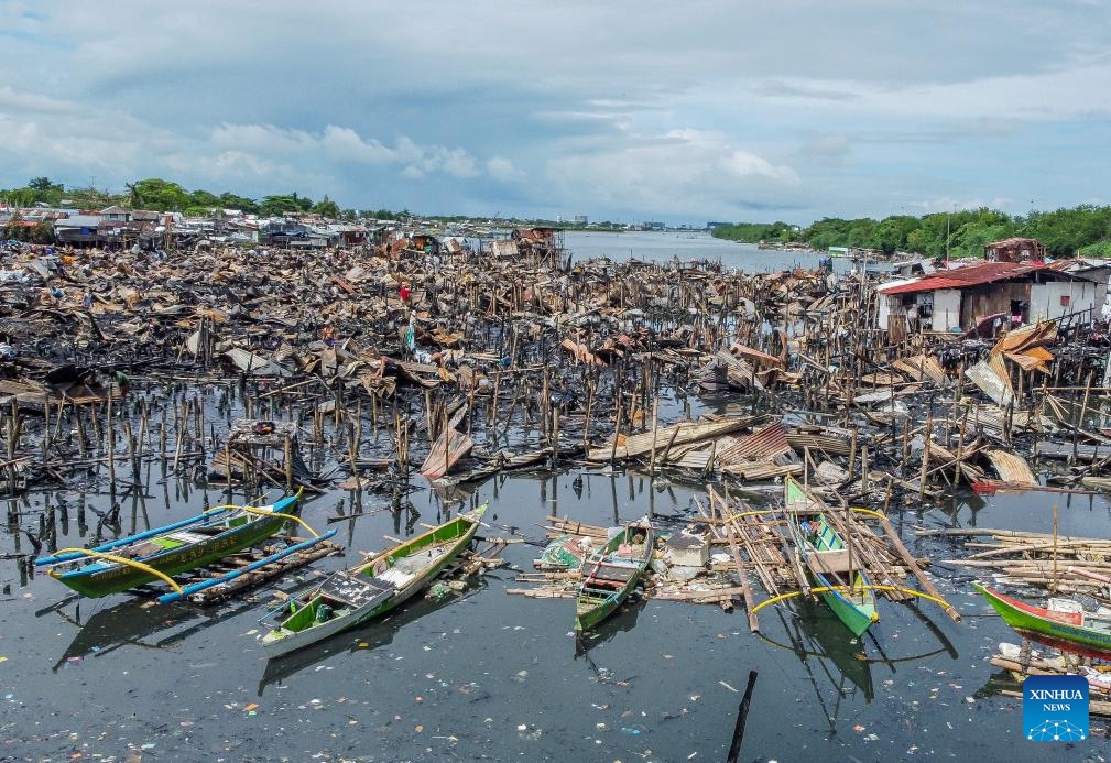 An aerial drone photo shows charred homes a day after a slum area fire in Cavite Province, the Philippines on Sept. 11, 2024. (Photo: Xinhua)