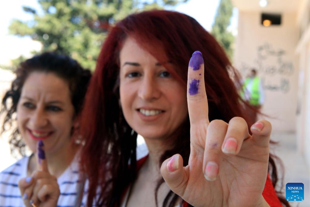 Voters display ink-marked fingers after voting in Balqa, Jordan, Sept. 10, 2024. Voting in Jordan's first parliamentary elections under a new electoral law designed to improve representation came to an end with a turnout of 32.1 percent, the country's Independent Election Commission said Tuesday. (Photo: Xinhua)