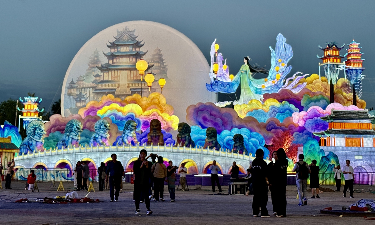 People attend a lantern festival in Beijing to celebrate the Mid-Autumn Festival. Photo: VCG