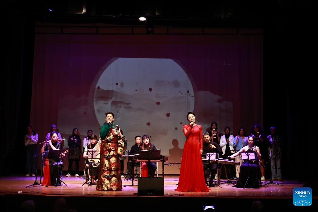 Chinese artists and Moroccan youths perform during a Mid-Autumn Festival gala evening in Rabat, capital of Morocco, Sept. 10, 2024. A gala evening to celebrate the upcoming Mid-Autumn Festival was held here on Tuesday, drawing more than 400 spectators entranced by performances from Chinese artists. (Photo: Xinhua)