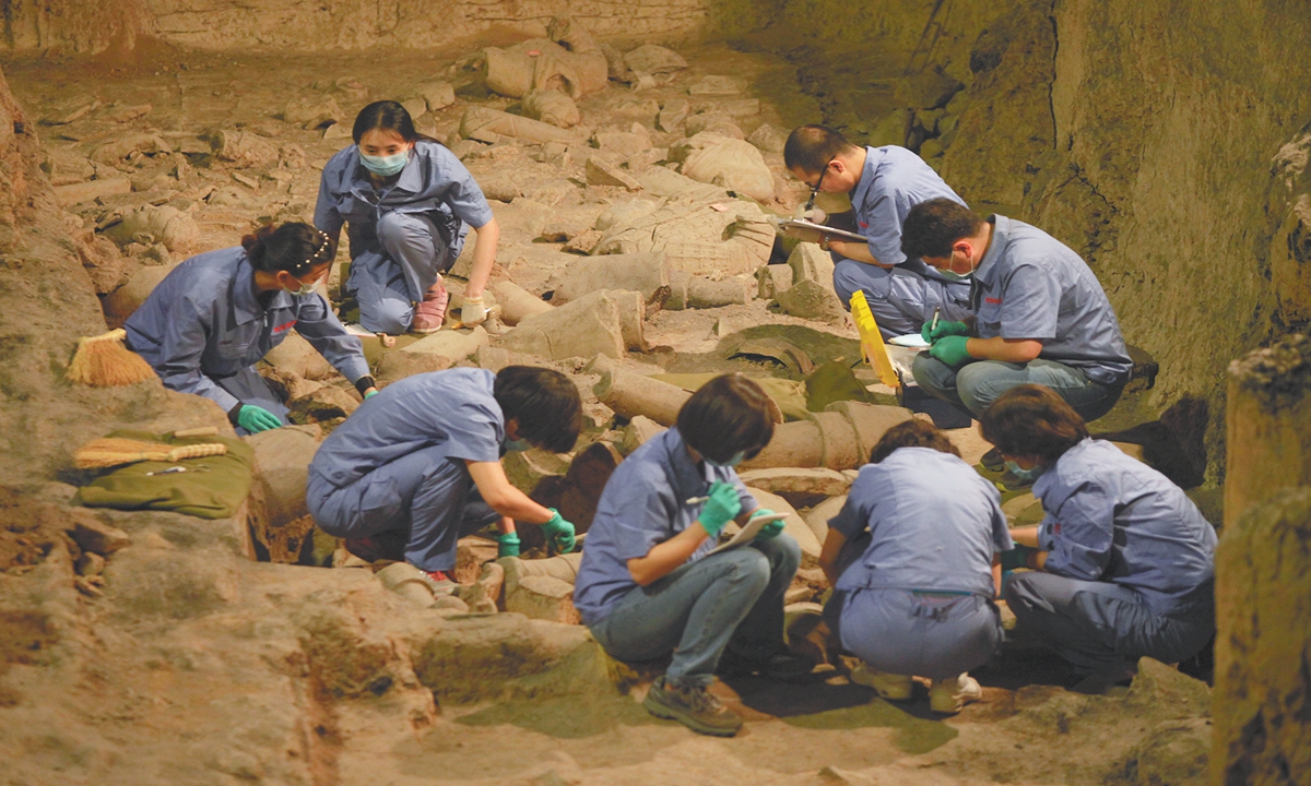 Archaeologists work on an excavation site of terracotta warriors in Xi'an, Northwest Chiuna's Shaanxi Province, on April 30, 2015. China launched a second excavation project that day on Pit No.2 of Qinshihuang's mausoleum. Photo: VCG