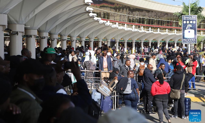 Passengers are stranded following a strike by aviation workers at Jomo Kenyatta International Airport in Nairobi, Kenya, on Sept. 11, 2024. Kenyan aviation workers have paralyzed flight operations at the country's Jomo Kenyatta International Airport (JKIA) in Nairobi, the capital of Kenya, over the planned leasing of the airport to an Indian company. The strike by the Kenya Airports Authority workers started on Tuesday night and has delayed several flights. (Photo: Xinhua)