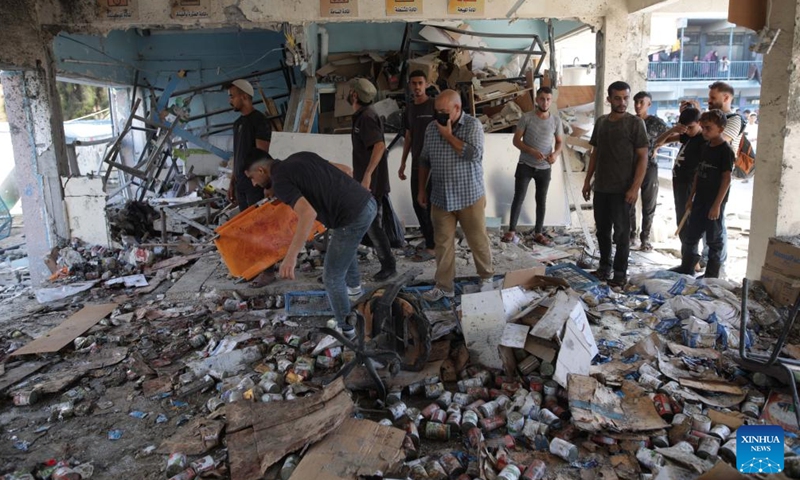 People are seen at a UN-run school sheltering displaced people after it was attacked by the Israeli army in the al-Nuseirat refugee camp, central Gaza Strip, on Sept. 11, 2024. At least 14 Palestinians were killed and 10 others wounded in an Israeli airstrike on a UN-run school sheltering displaced people in the central Gaza Strip, according to Palestinian sources on Wednesday. (Photo: Xinhua)