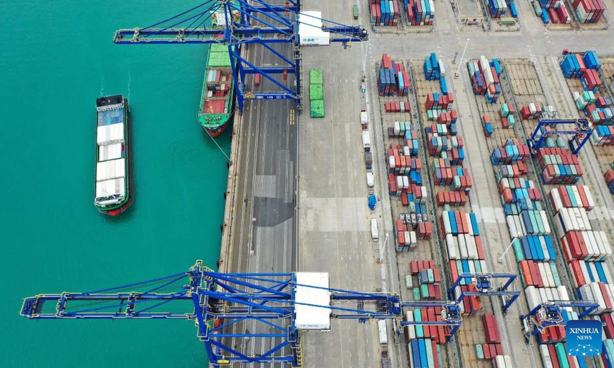 An aerial drone photo taken on March 13,<strong></strong> 2024 shows the Yangpu international container terminal in south China's Hainan Province. Major projects in China's tropical island province of Hainan are under smooth construction. In recent years, China has made solid strides in making the Hainan Free Trade Port into a paradigm of reform and opening-up at a high level in the new era. Photo: Xinhua