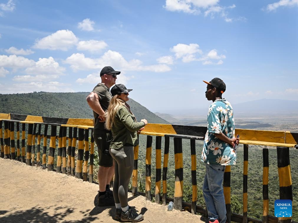 Tourists are seen at a viewpoint of the Great Rift Valley in Kiambu county, Kenya, Sept. 10, 2024. (Photo: Xinhua)