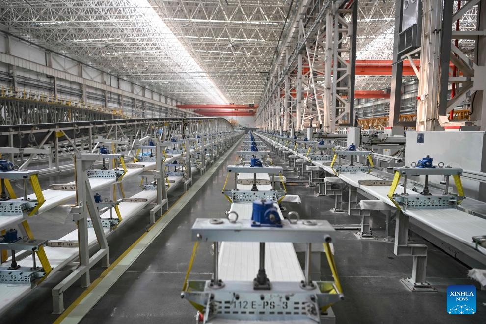 This photo taken on Sept. 10, 2024 shows an interior view of a wind power equipment manufacturing enterprise at an industrial park in Kazak Autonomous County of Barkol, northwest China's Xinjiang Uygur Autonomous Region. Rich in wind energy resources, Hami is one of the country's major wind power bases. Making the best use of resource advantages, the city has accelerated the development and construction of wind power in recent years to promote green transformation of energy. (Photo: Xinhua)