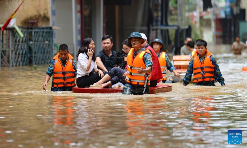 Rescuers evacuate local residents affected by flooding in Gia Lam District, Hanoi, Vietnam, Sept. 12, 2024. Typhoon Yagi and the consequent landslides and floods have left 226 dead and 104 missing in Vietnam as of Thursday afternoon, the Ministry of Agriculture and Rural Development announced. (Photo: Xinhua)