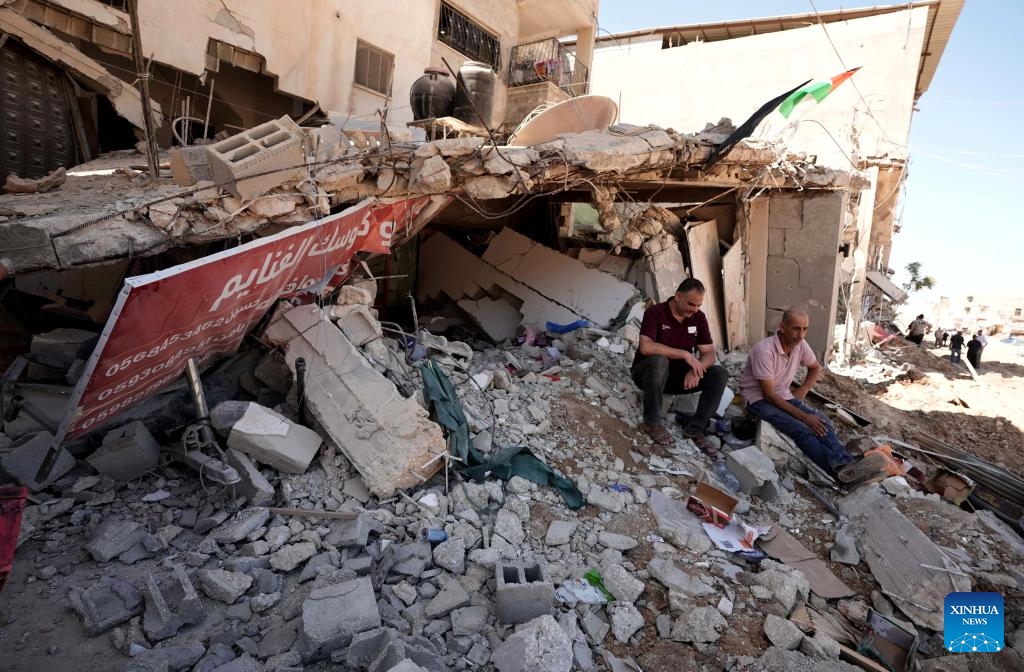 Palestinians check damaged buildings at Nur Shams refugee camp after an Israeli military operation in the West Bank city of Tulkarm and its refugee camps, Sept. 11, 2024. (Photo: Xinhua)