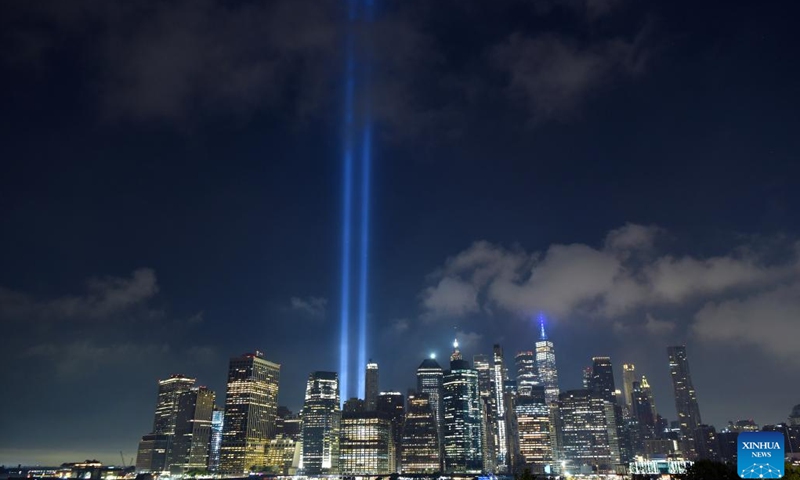 The Tribute in Light, an art installation of searchlights to create two vertical columns of light to represent the Twin Towers, is seen to mark the 23rd anniversary of the 9/11 attacks in New York, the United States, on Sept. 11, 2024. (Photo: Xinhua)