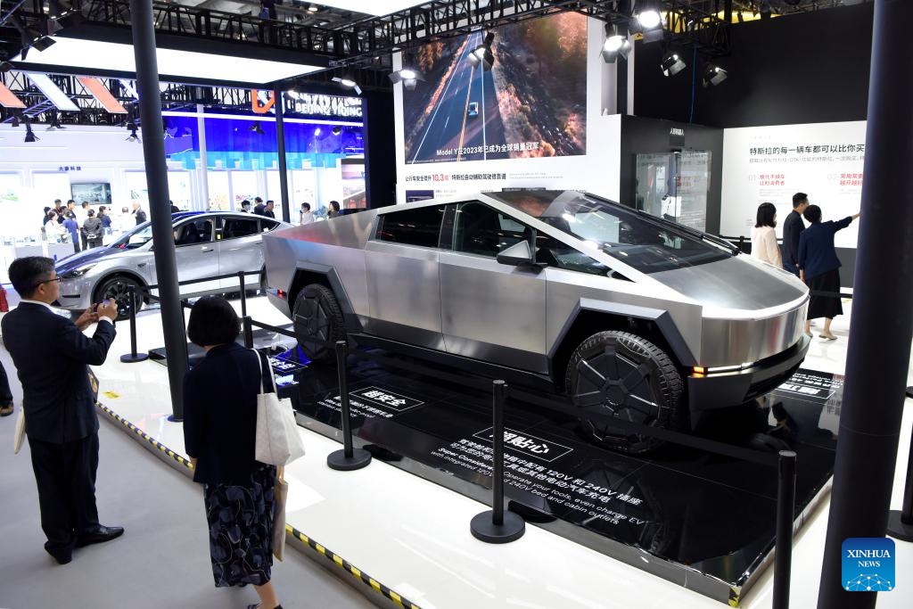 People visit the booth of Tesla during the 2024 China International Fair for Trade in Services (CIFTIS) at the China National Convention Center in Beijing, capital of China, Sept. 12, 2024. Themed Global Services, Shared Prosperity, the 2024 CIFTIS opened at the China National Convention Center and the Shougang Park in Beijing on Thursday. (Photo: Xinhua)