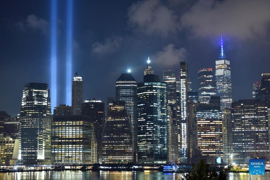 The Tribute in Light, an art installation of searchlights to create two vertical columns of light to represent the Twin Towers, is seen to mark the 23rd anniversary of the 9/11 attacks in New York, the United States, on Sept. 11, 2024. (Photo: Xinhua)