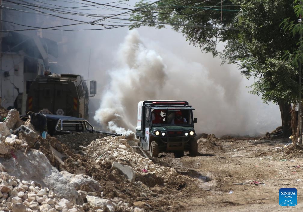 Vehicles run on the street during an Israeli army operation in the refugee camp of Tulkarm in the north of the West Bank, Sept. 12, 2024. (Photo: Xinhua)