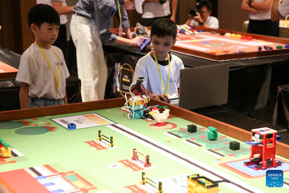 Students participate in a contest of World Robot Olympiad 2024 in Yangon, Myanmar, Sept. 15, 2024.