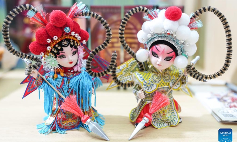 Cultural creative products themed on traditional opera are pictured at the exhibition stand of Tongzhou District of Beijing during the 2024 China International Fair for Trade in Services (CIFTIS) at the Shougang Park in Beijing, capital of China, Sept. 15, 2024. 