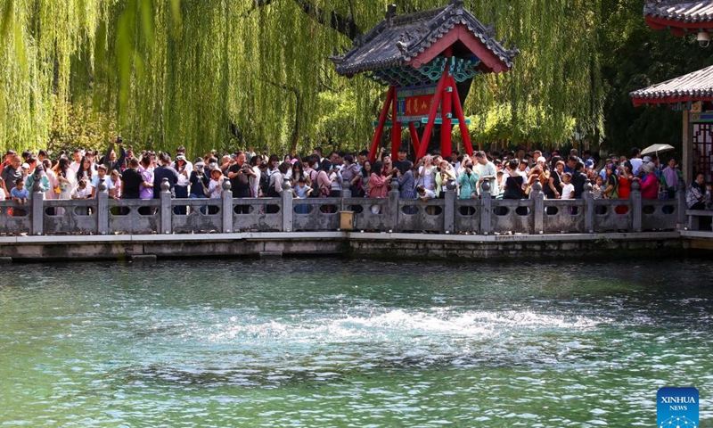 People visit the Baotu Spring in Jinan, east China's Shandong Province, Sept. 15, 2024. The Mid-Autumn Festival is one of China's most important traditional holidays. Taking place annually on the 15th day of the eighth month in the Chinese lunar calendar, it will be observed on Sept. 17 this year. (Photo: Xinhua)