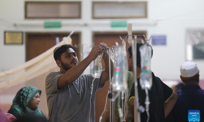 Patients infected with dengue receive treatment at a hospital in Dhaka, Bangladesh, Sept. 14, 2024. (Xinhua)