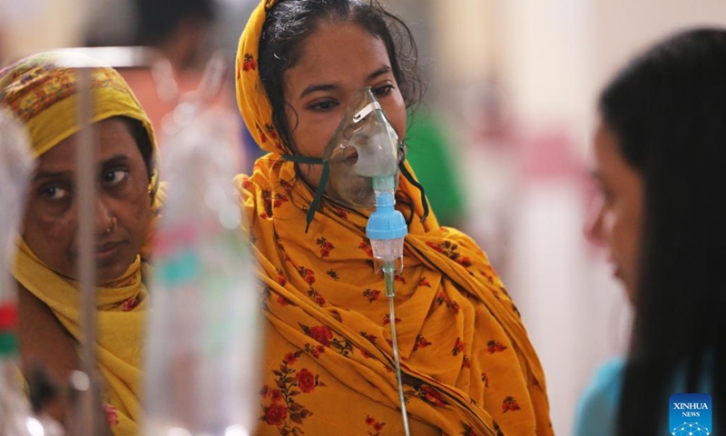 Patients infected with dengue receive treatment at a hospital in Dhaka, Bangladesh, Sept. 14, 2024. (Xinhua)