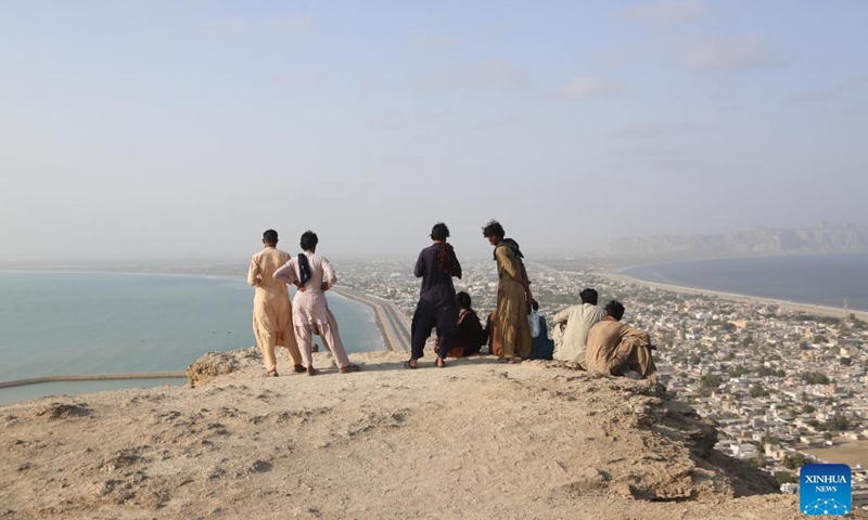 People enjoy the scenery in Gwadar city of Pakistan's southwest Balochistan province, Sept. 15, 2024. (Xinhua/Ahmad Kamal)