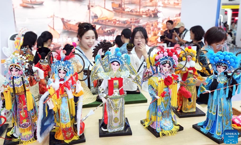 Visitors view cultural creative products at the exhibition stand of Tongzhou District of Beijing during the 2024 China International Fair for Trade in Services (CIFTIS) at the Shougang Park in Beijing, capital of China, Sept. 15, 2024.