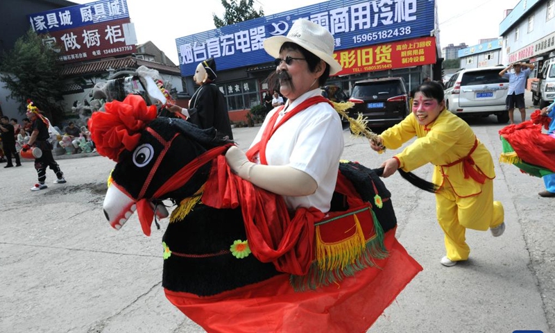 Actors perform Yangge folk dance in Yantai, east China's Shandong Province, Sept. 15, 2024. The Mid-Autumn Festival is one of China's most important traditional holidays. Taking place annually on the 15th day of the eighth month in the Chinese lunar calendar, it will be observed on Sept. 17 this year. (Photo: Xinhua)