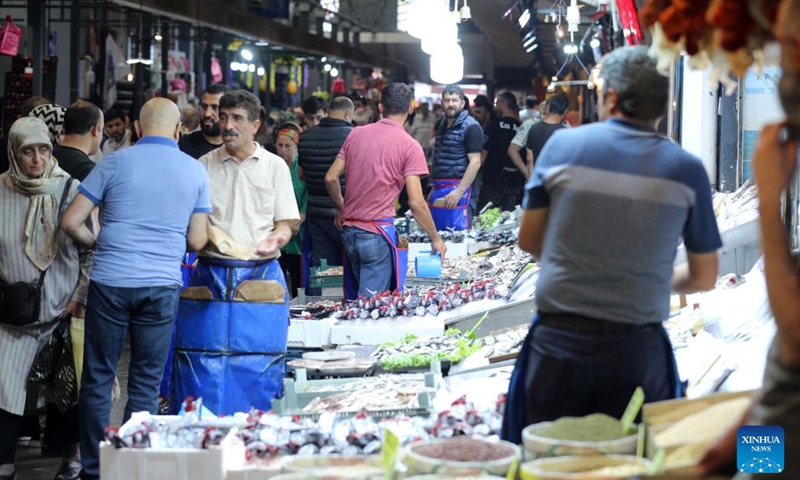 People shop at a local market in Ankara, Türkiye, on Sept. 16, 2024. Easing monetary policy right now is premature as it may hinder disinflation efforts that have yielded successful results in Türkiye, said analysts as Türkiye's central bank is expected to announce the next rate decision this Thursday. (Photo: Xinhua)