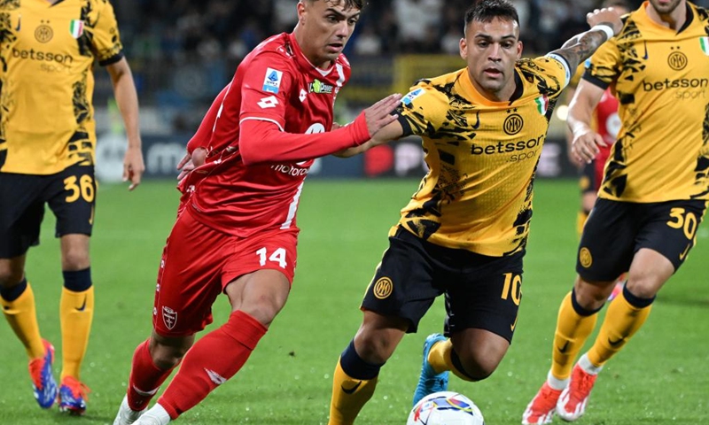 Inter Milan's Lautaro Martinez (2nd R) vies with Monza's Daniel Maldini during the Italian Serie A football match between Monza and Inter Milan in Monza, Italy, Sept. 15, 2024. (Photo: Xinhua)