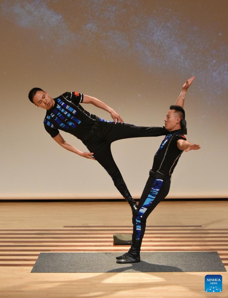 Actors of an art delegation from central China's Hubei Province performs at a celebration event, dubbed Ode to the Moon, in the city of Christchurch, New Zealand South Island, Sept. 15, 2024. This event aims to celebrate the Mid-Autumn Festival and sister-city ties between Hubei's capital Wuhan and Christchurch. Featuring dance, songs, instrumental ensemble, as well as acrobatics, magic show and tai-chi demonstrations, the performances attracted more than 700 people.(Photo: Xinhua)