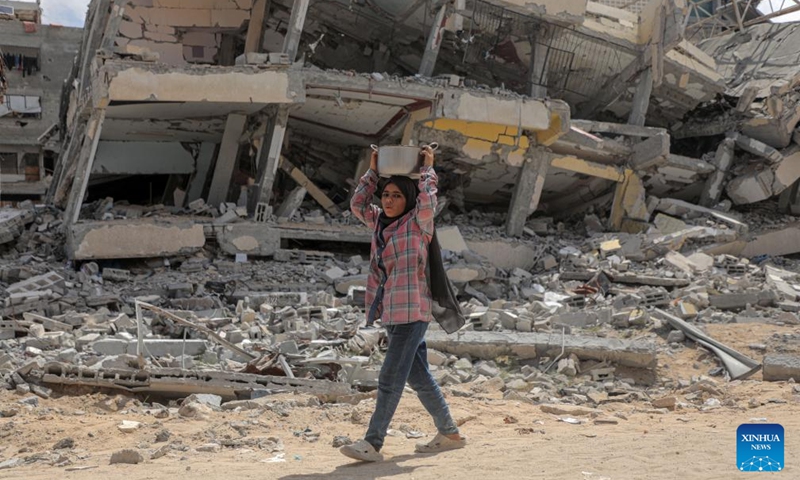 A Palestinian is seen in the city of Khan Younis in the south of Gaza Strip on Sept. 16, 2024. Israel has been launching a large-scale offensive against Hamas in the Gaza Strip to retaliate against a Hamas rampage through the southern Israeli border on Oct. 7, 2023, during which about 1,200 people were killed and about 250 taken hostage. (Photo: Xinhua)