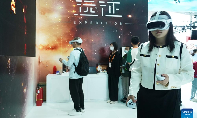 Visitors experience VR gaming devices during the 2024 China International Fair for Trade in Services (CIFTIS) in the Cultural & Tourism Service thematic exhibition area at the Shougang Park in Beijing, capital of China, Sept. 16, 2024. The 2024 China International Fair for Trade in Services concluded in Beijing on Monday.  (Photo: Xinhua)