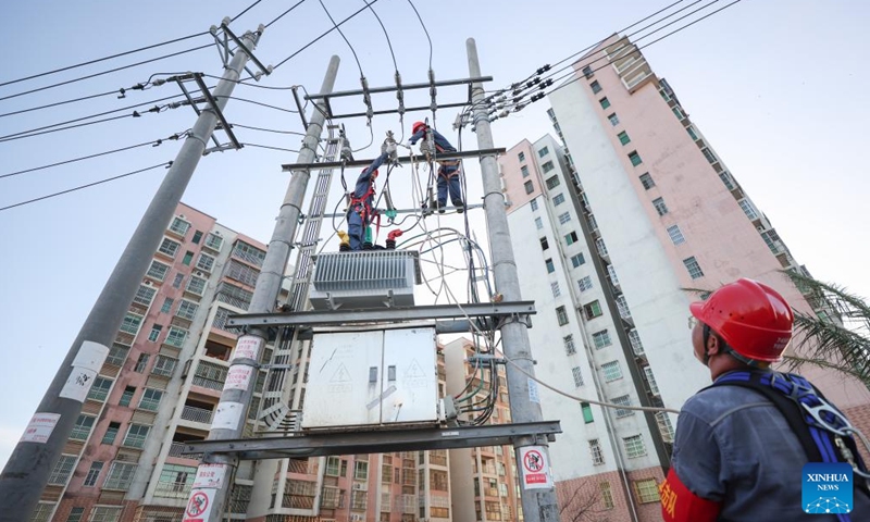 Maintenance workers Chen Hongfei (2nd L), Yao Jianglian (1st L) and Li Bing repair power facilities in Longlou Township of Wenchang City, south China's Hainan Province, Sept. 13, 2024. Due to the impact of Super Typhoon Yagi, power facilities were damaged in different places in Hainan in the past few days.

China Southern Power Grid has organized personnel and made efforts in power repair works to make the province to fully restore power supply as soon as possible. (Photo: Xinhua)