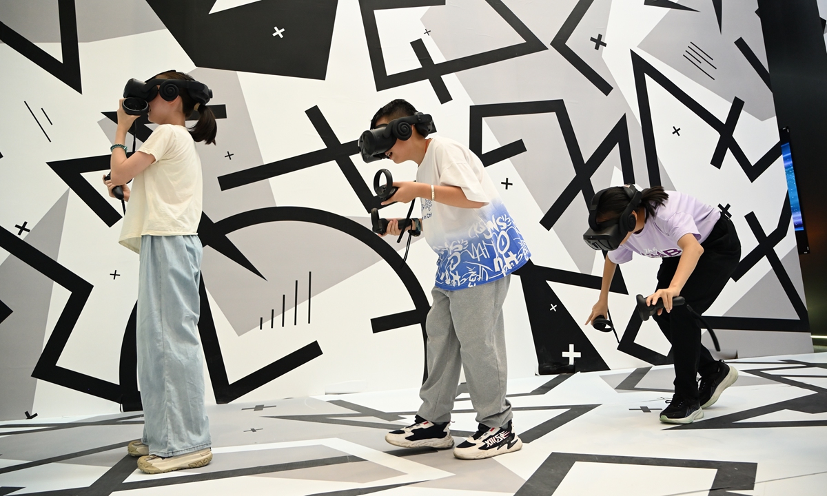 The photo captures visitors touring a museum through virtual reality technologies during the 10th Chinese exposition of museums and relevant products and technologies on August 23, 2024. Photo: VCG