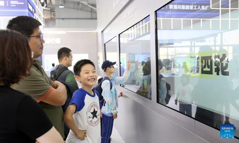 Children have fun during the 2024 China International Fair for Trade in Services (CIFTIS) at the Shougang Park in Beijing, capital of China, Sept. 16, 2024. The 2024 China International Fair for Trade in Services concluded in Beijing on Monday.   (Photo: Xinhua)