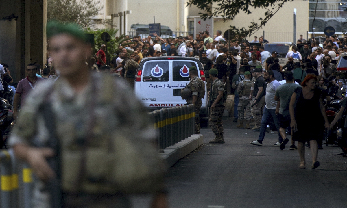 Lebanese army soldiers secure the area for an ambulance to enter the premises of the American University hospital in Beirut on September 17, 2024, after coordinated explosions of pagers across Lebanon the same day. At least 12 were killed as of press time. Photo: VCG