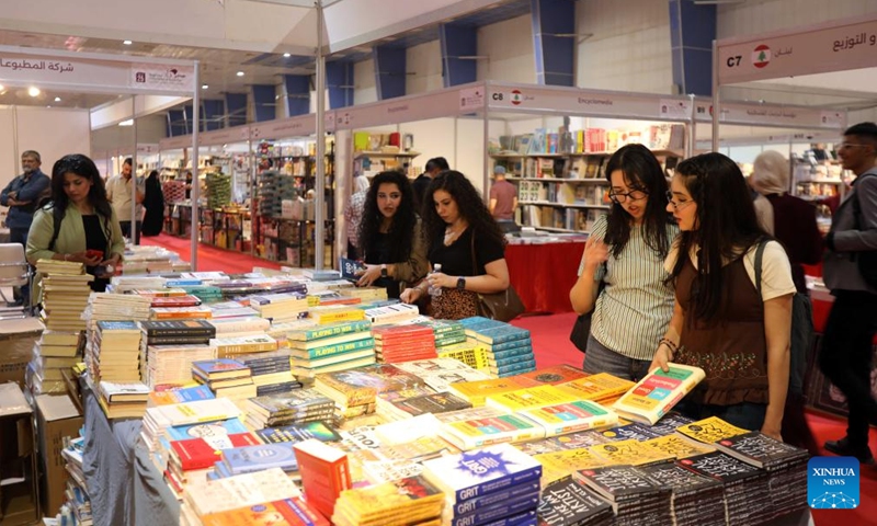 People visit the 25th Baghdad International Book Fair in Baghdad, Iraq, on Sept. 17, 2024. (Photo: Xinhua)