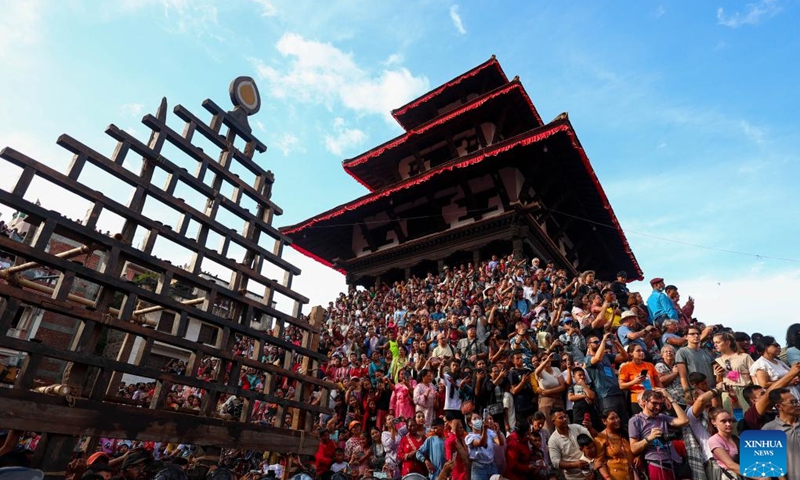 People gather to watch the chariot procession during the Indra Jatra Festival in Kathmandu, Nepal, Sept. 17, 2024.

The eight-day festival that kicked off on Sept. 15 honors the god of rain Indra. (Photo: Xinhua)