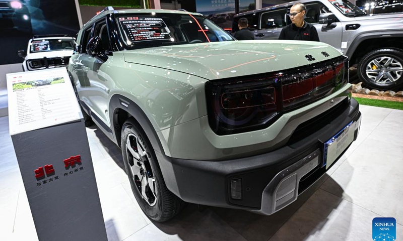 A BAIC BJ30 car is seen at the 2024 Hainan Autumn Auto Show in Hainan International Conference and Exhibition Center in Haikou, capital of south China's Hainan Province, Sept. 16, 2024. The show was held from Sept. 13 to 16, with nearly one hundred car manufacturers showcasing their products on a display area of more than 50,000 square meters. About 70 percent of the exhibited vehicles were new energy vehicles. (Photo: Xinhua)