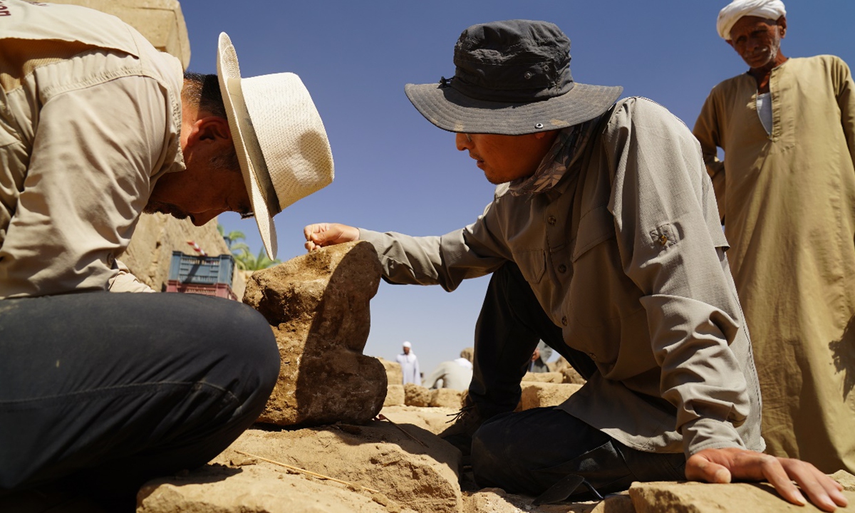 Archaeologists from the China-Egypt archaeological mission work at the site in Egypt. Photo: Courtesy of Jia Xiaobing