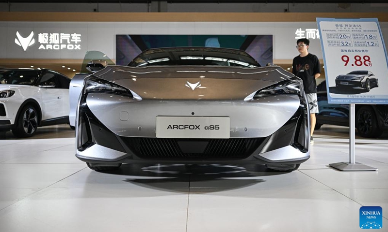 A Arcfox Alpha S5 car is seen at the 2024 Hainan Autumn Auto Show in Hainan International Conference and Exhibition Center in Haikou, capital of south China's Hainan Province, Sept. 16, 2024. The show was held from Sept. 13 to 16, with nearly one hundred car manufacturers showcasing their products on a display area of more than 50,000 square meters. About 70 percent of the exhibited vehicles were new energy vehicles. (Photo: Xinhua)