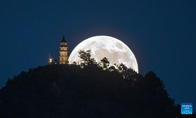 The moon rises above Huangyan District of Taizhou, east China's Zhejiang Province, Sept. 17, 2024. The Mid-Autumn Festival in China, which is celebrated annually on the 15th day of the eighth month in the Chinese lunar calendar, falls on Sept. 17 this year. As one of China's most important traditional holidays, it is a joyous time when families come together, appreciate the full moon and share moon cakes, a traditional pastry, to mark the harvest season.  (Photo: Xinhua)