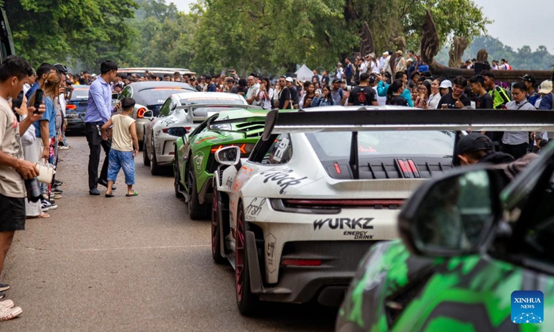 Luxury cars are displayed at the complex of the Angkor Archaeological Park in northwest Cambodia on Sept. 17, 2024. More than 100 luxury cars taking part in a car rally gathered in front of the Angkor Wat temple, with the aim of showcasing the UNESCO-listed world heritage site to the world.  (Photo: Xinhua)