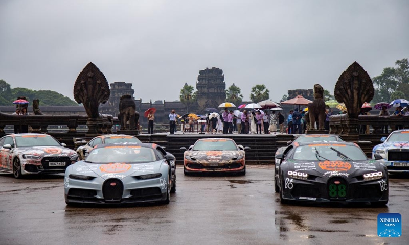 Luxury cars are displayed at the complex of the Angkor Archaeological Park in northwest Cambodia on Sept. 17, 2024. More than 100 luxury cars taking part in a car rally gathered in front of the Angkor Wat temple, with the aim of showcasing the UNESCO-listed world heritage site to the world.  (Photo: Xinhua)