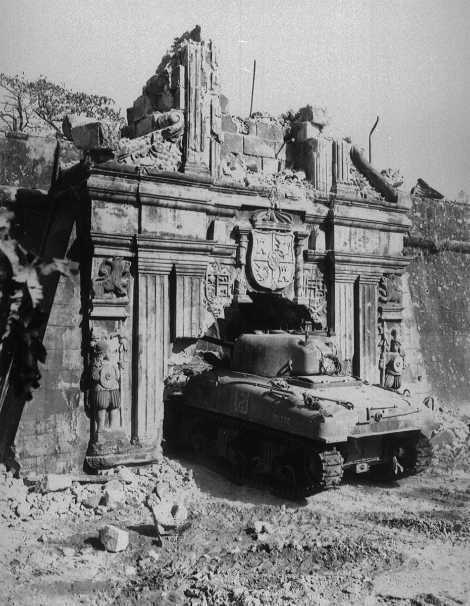 An American tank passes through the archway of the ruined old fort of Manila in the Philippines in February 1945. Photo: AFP 