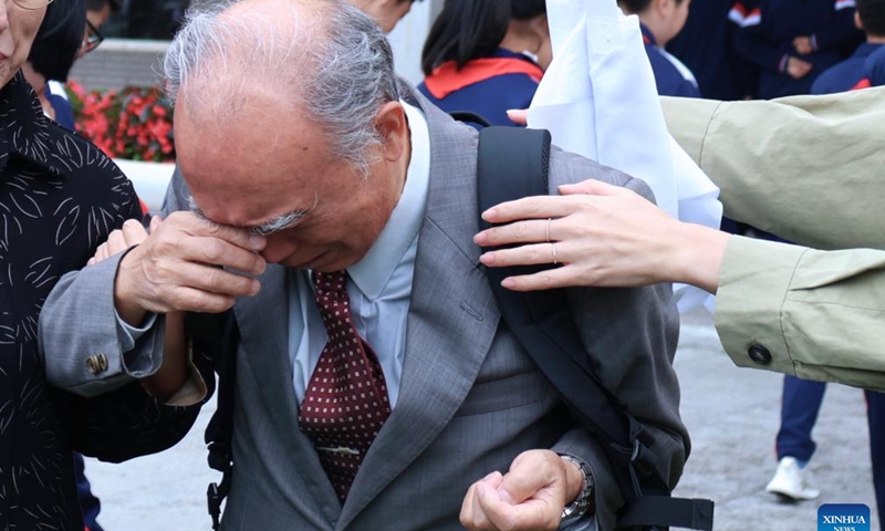 Kuroi Akio, descendant of WWII Japanese invader Kuroi Keijirou, cries after attending an apology ceremony in Gongzhuling, northeast China's Jilin Province, Sept. 14, 2024. (Photo: Xinhua)