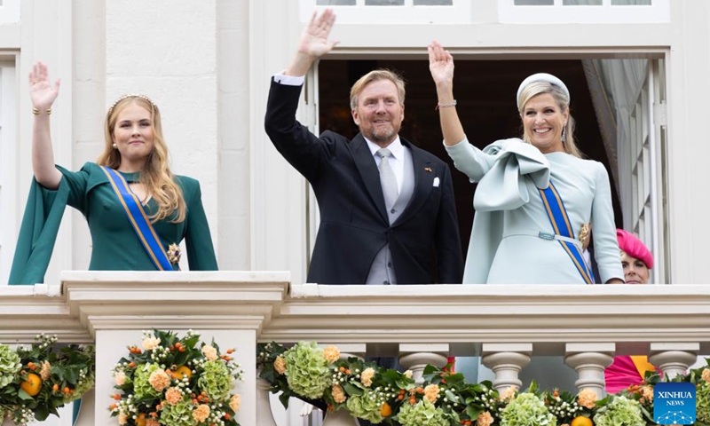 Dutch Princess Amalia, King Willem-Alexander and Queen Maxima (from L to R) wave to people on the balcony of Noordeinde Palace on Prinsjesdag, Prince's Day, in The Hague, the Netherlands, on Sept. 17, 2024. The third Tuesday in September is Prince's Day in the Netherlands. It marks the opening of the Dutch parliamentary season, and on this day the reigning monarch outlines the government's plans for the year ahead.  (Photo: Xinhua)