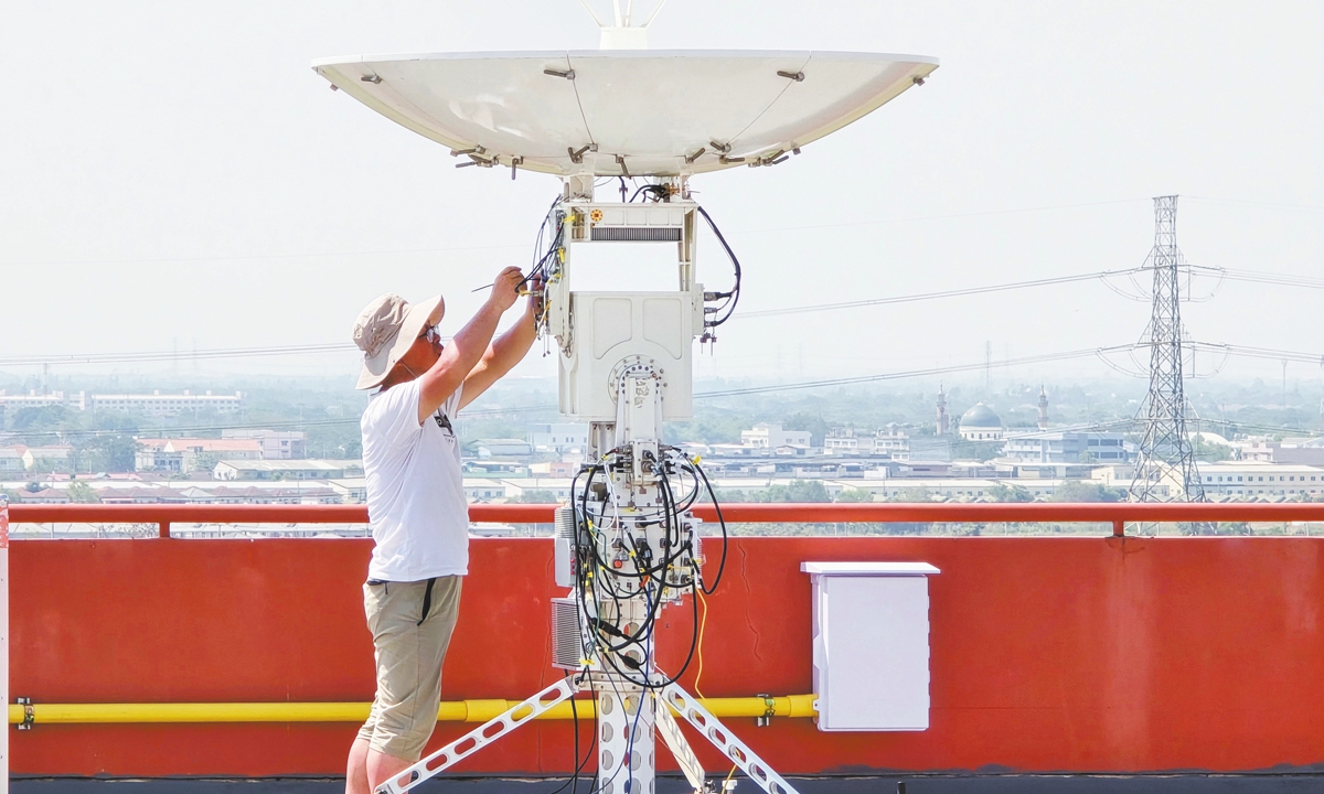 A technician from Galaxy Space checks satellite antenna at the Mahanakorn University of Technology, Thailand, on March 6, 2024. Photo: Courtesy of Galaxy Space