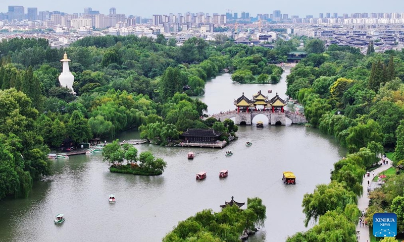 An aerial drone photo shows tourists visiting the Slender West Lake scenic spot in Yangzhou, east China's Jiangsu Province, Sept. 17, 2024.  (Photo: Xinhua)