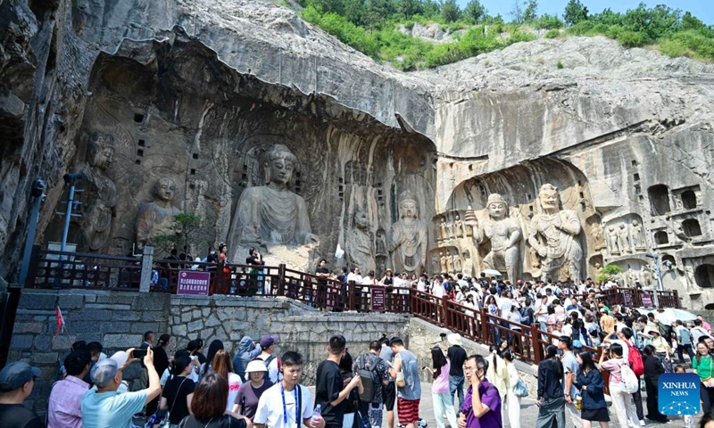 People visit the Longmen Grottoes scenic spot in Luoyang City, central China's Henan Province, Sept. 16, 2024.  (Photo: Xinhua)