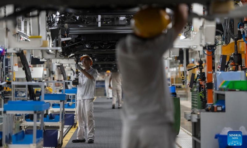 Workers work at an assembly line of Dongfeng Motor Corporation in Wuhan, central China's Hubei Province, Sept. 6, 2024.  (Photo: Xinhua)