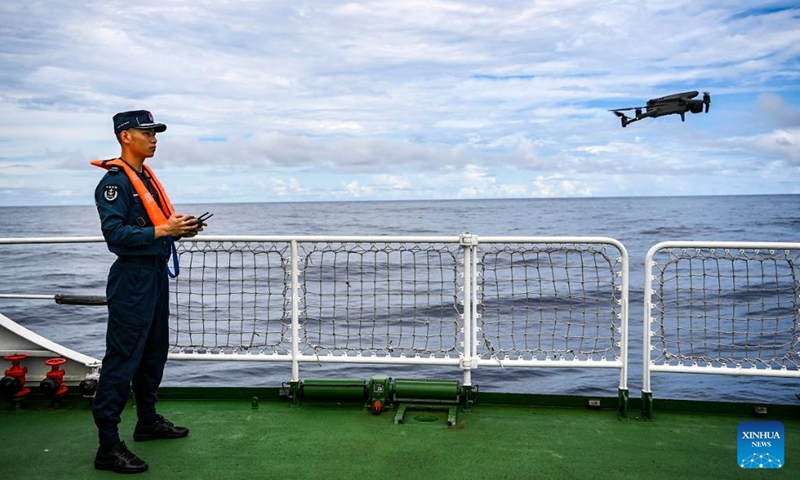 A law enforcer attends a drone control training session on China Coast Guard (CCG) vessel Sifang during a patrol task in waters adjacent to China's Huangyan Dao, Sept. 14, 2024. (Photo: Xinhua)